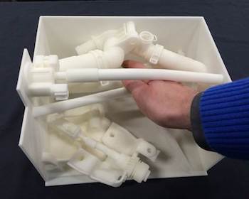 Testing hand clearance is one example where 3D-printed models are more effective than virtual simulation